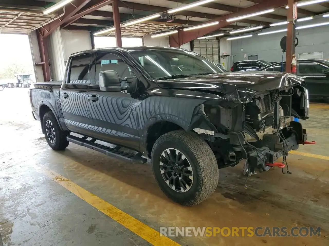 4 Photograph of a damaged car 1N6AA1ED0NN104823 NISSAN TITAN 2022