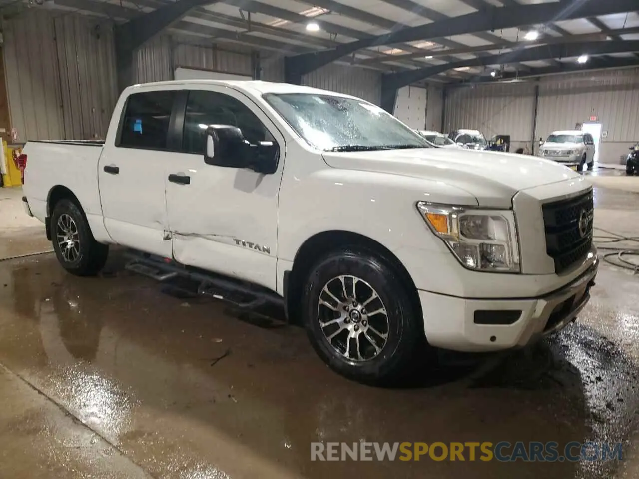 4 Photograph of a damaged car 1N6AA1EF7NN100298 NISSAN TITAN 2022