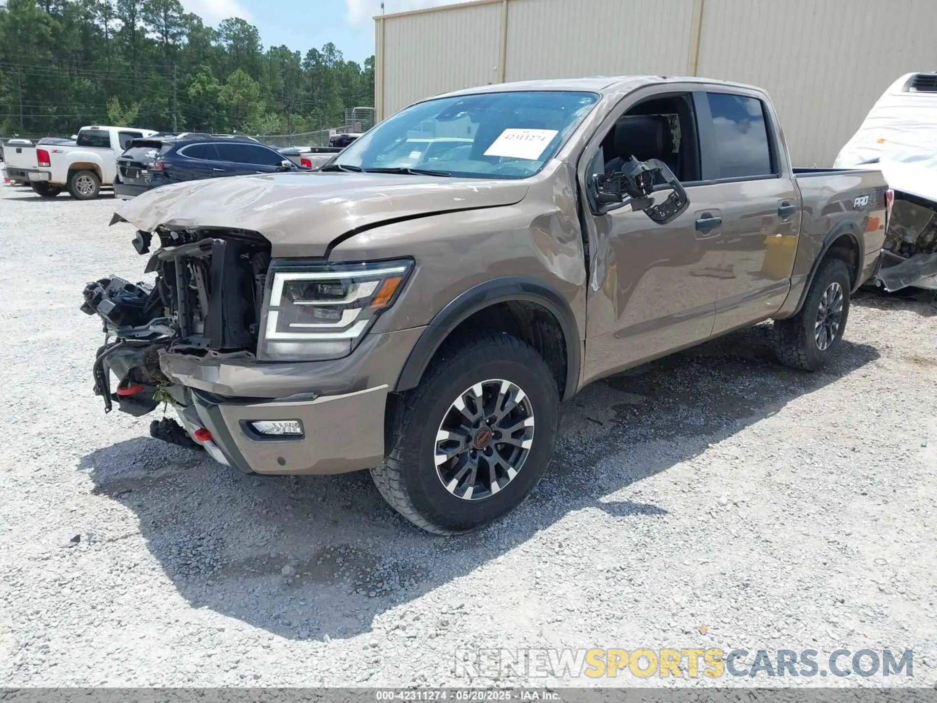 2 Photograph of a damaged car 1N6AA1ED0PN112536 NISSAN TITAN 2023