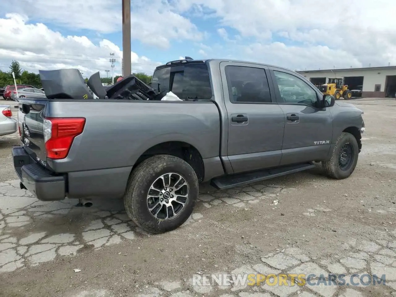 3 Photograph of a damaged car 1N6AA1ED2PN109153 NISSAN TITAN 2023
