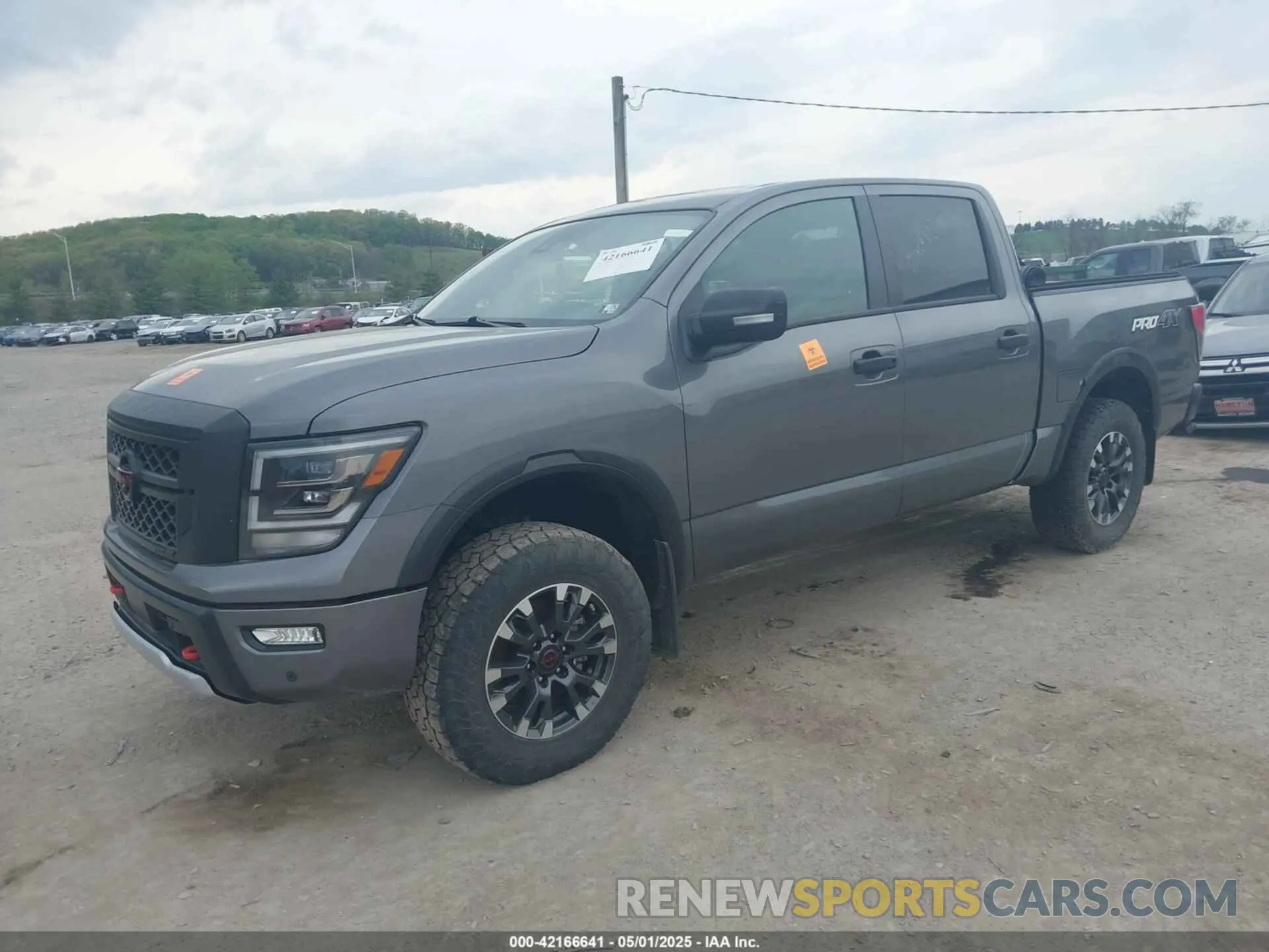 2 Photograph of a damaged car 1N6AA1ED7PN106443 NISSAN TITAN 2023
