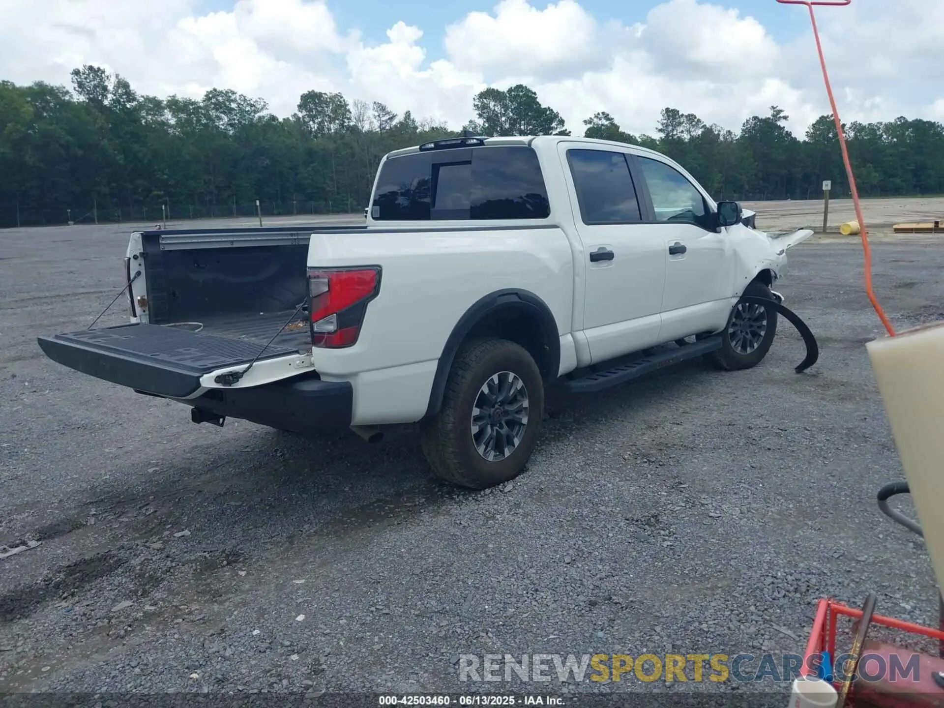 4 Photograph of a damaged car 1N6AA1ED8PN104913 NISSAN TITAN 2023