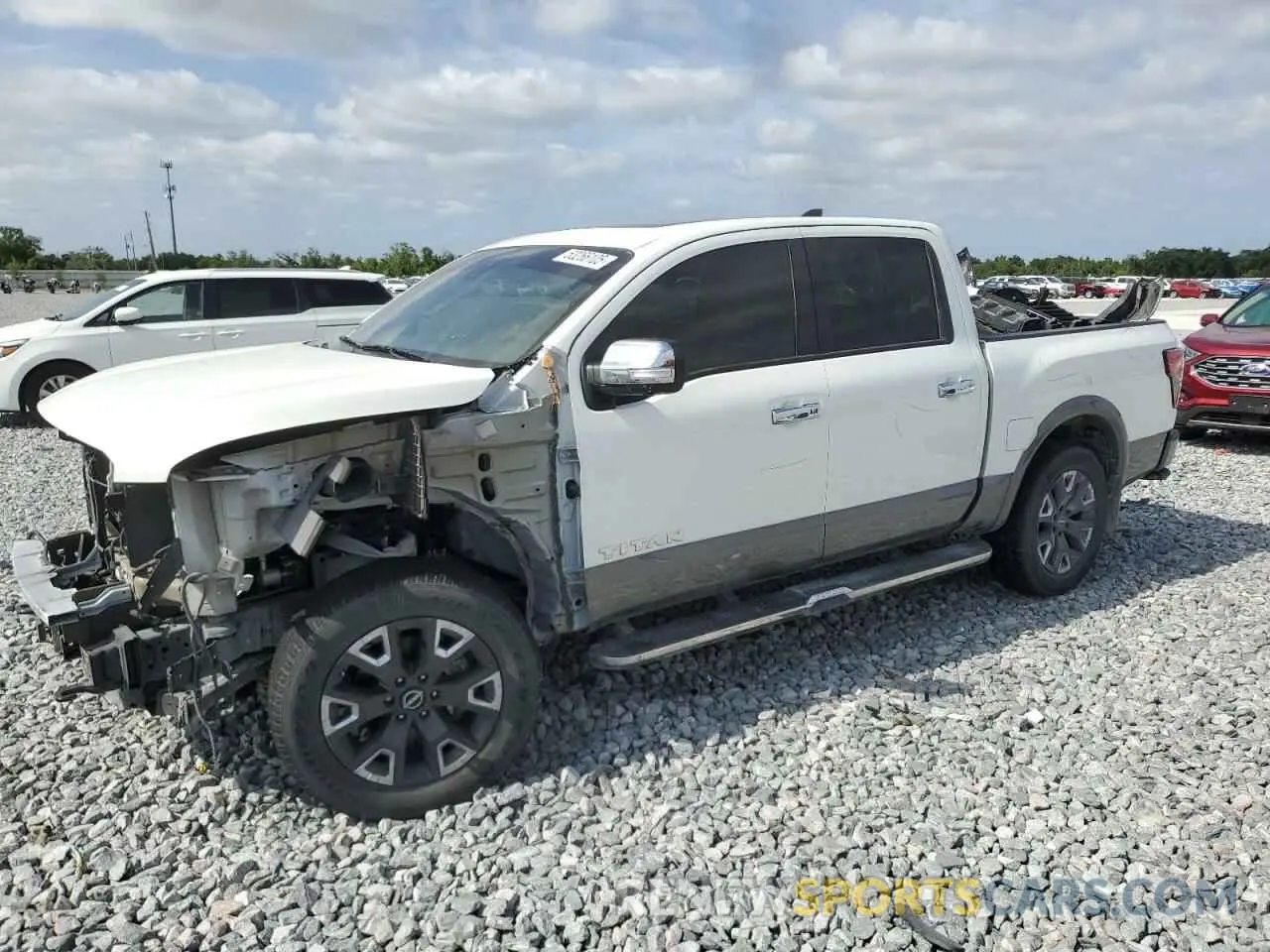 1 Photograph of a damaged car 1N6AA1ED9PN104385 NISSAN TITAN 2023