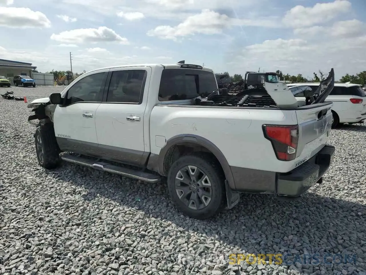 2 Photograph of a damaged car 1N6AA1ED9PN104385 NISSAN TITAN 2023