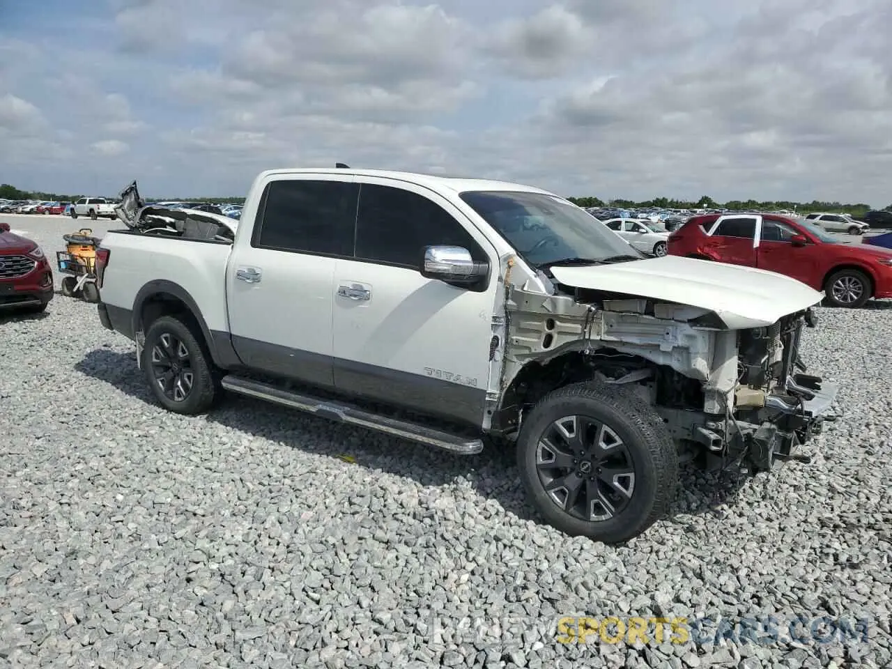 4 Photograph of a damaged car 1N6AA1ED9PN104385 NISSAN TITAN 2023