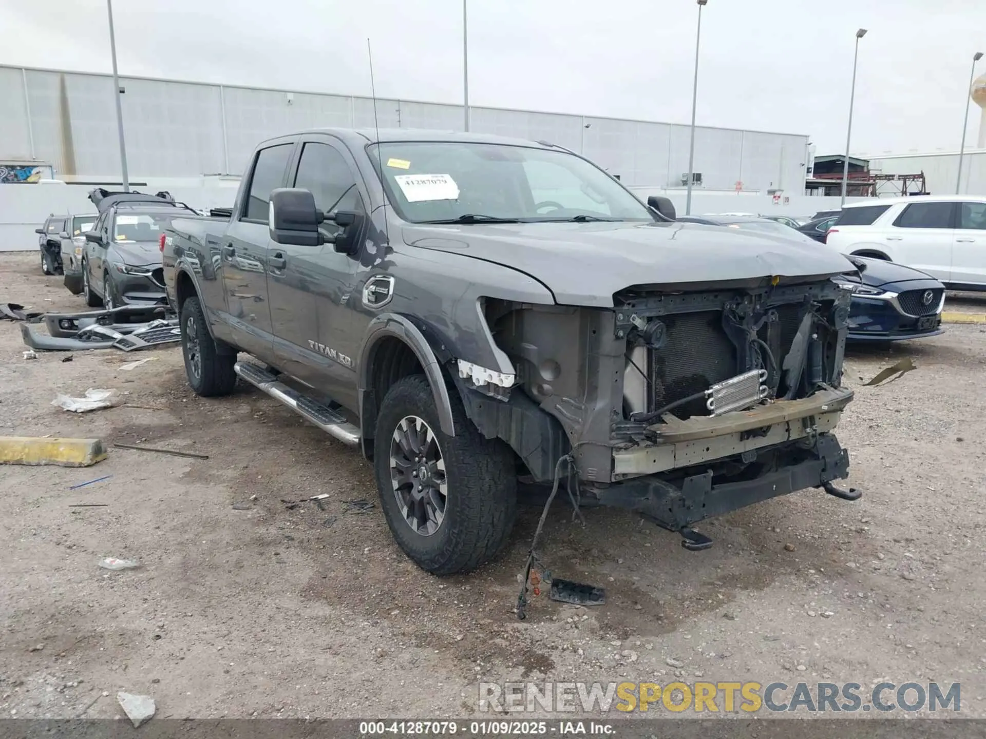 1 Photograph of a damaged car 1N6BA1F44KN509548 NISSAN TITAN XD 2019