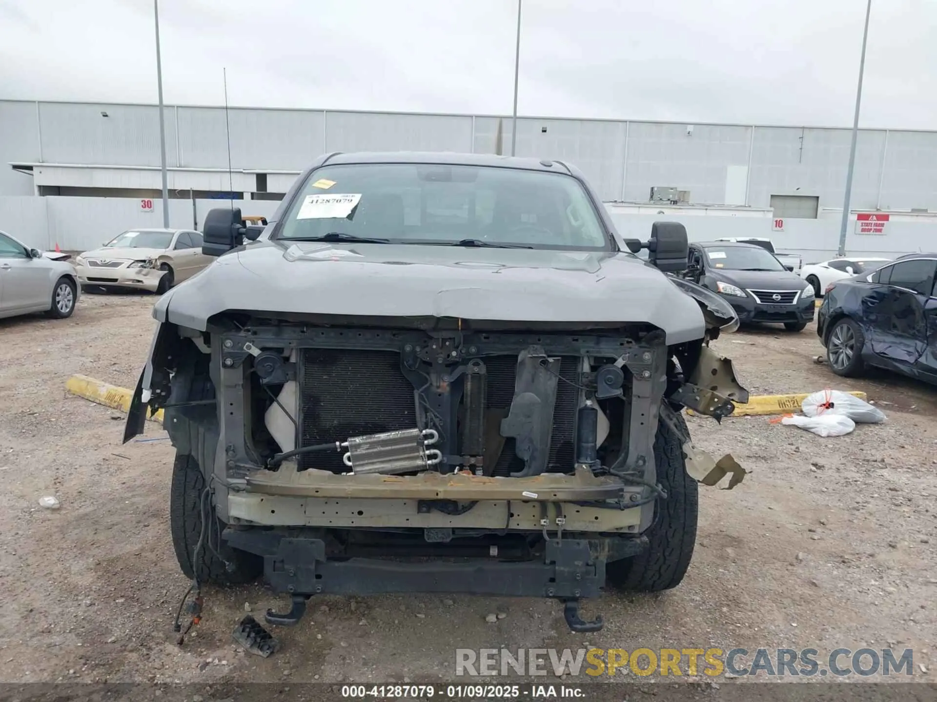 13 Photograph of a damaged car 1N6BA1F44KN509548 NISSAN TITAN XD 2019