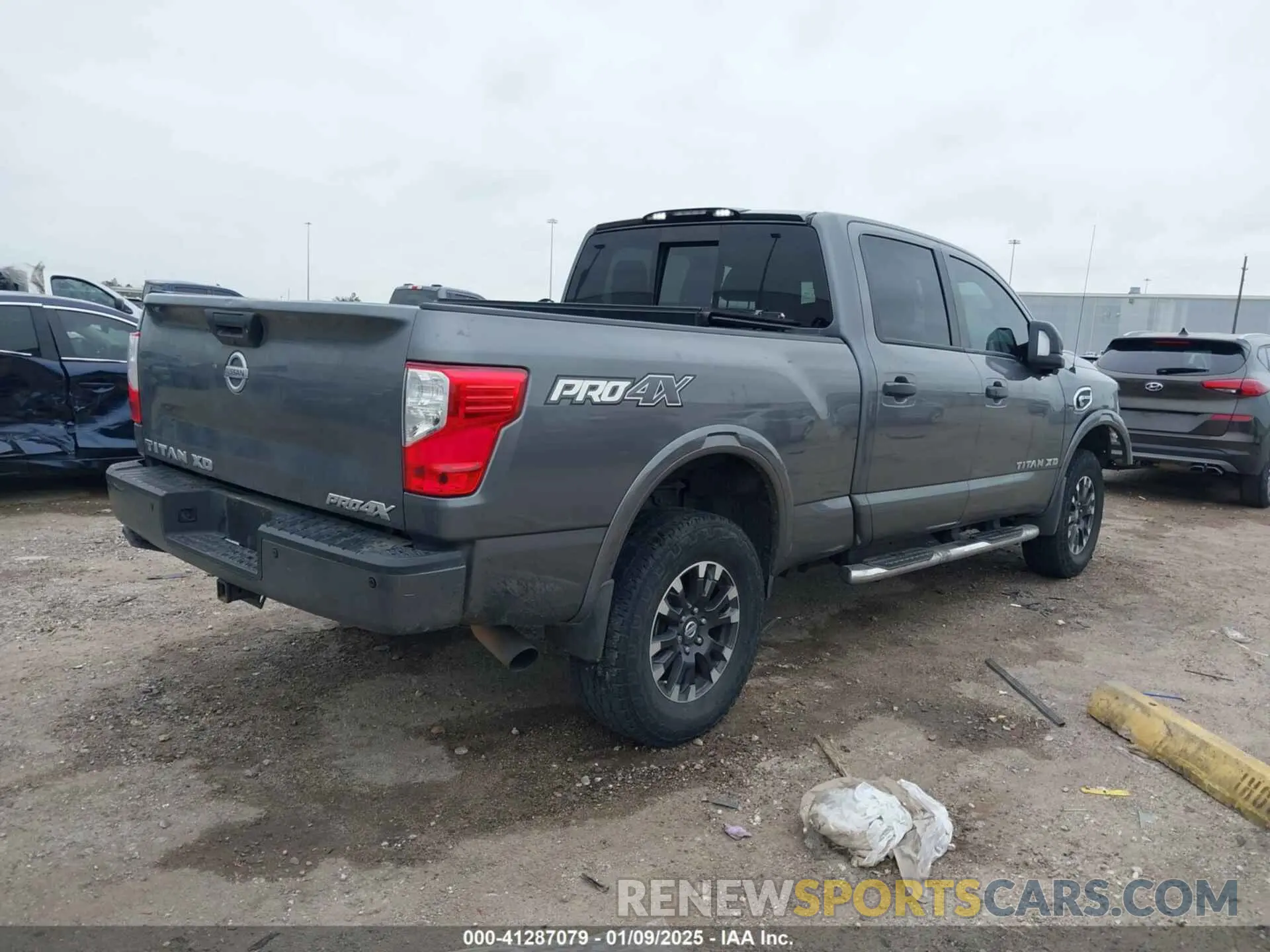 4 Photograph of a damaged car 1N6BA1F44KN509548 NISSAN TITAN XD 2019