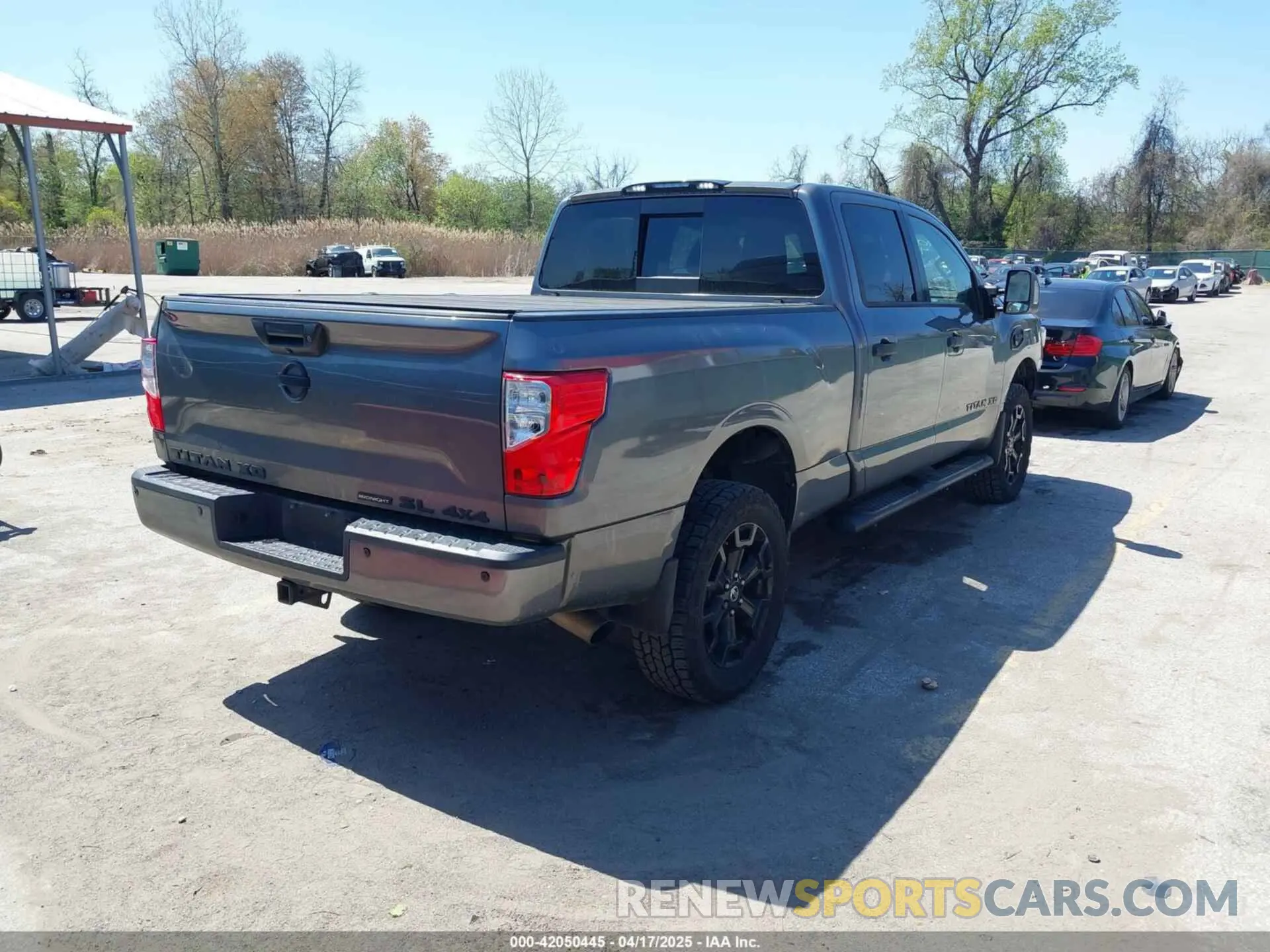 4 Photograph of a damaged car 1N6BA1F45KN507050 NISSAN TITAN XD 2019