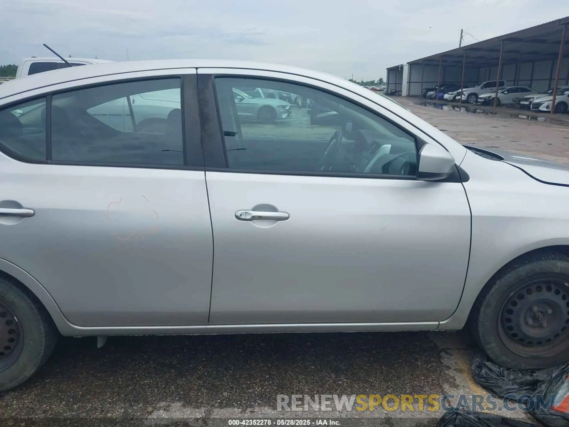 13 Photograph of a damaged car 3N1CN7AP0KL852246 NISSAN VERSA 2019