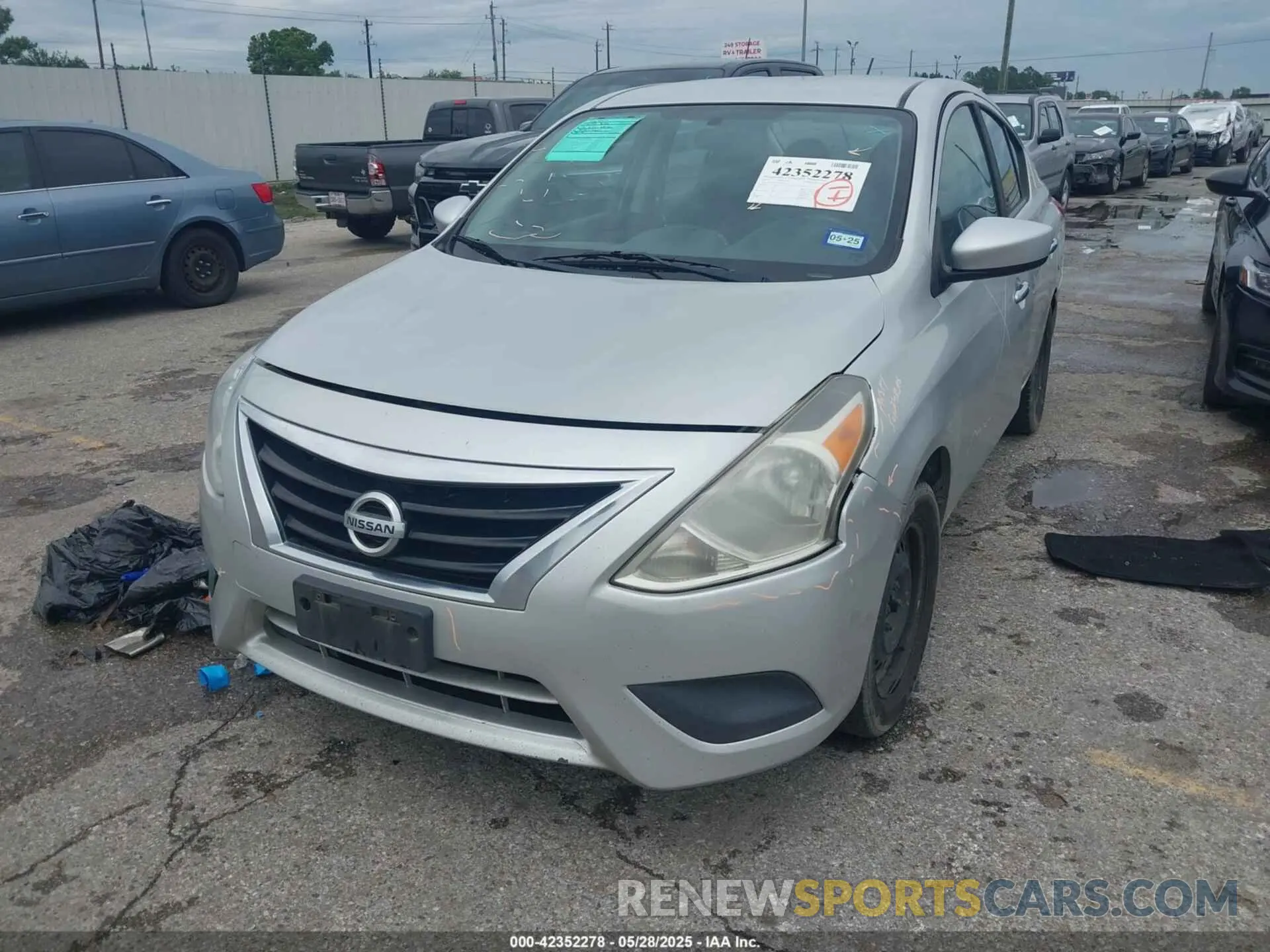 2 Photograph of a damaged car 3N1CN7AP0KL852246 NISSAN VERSA 2019