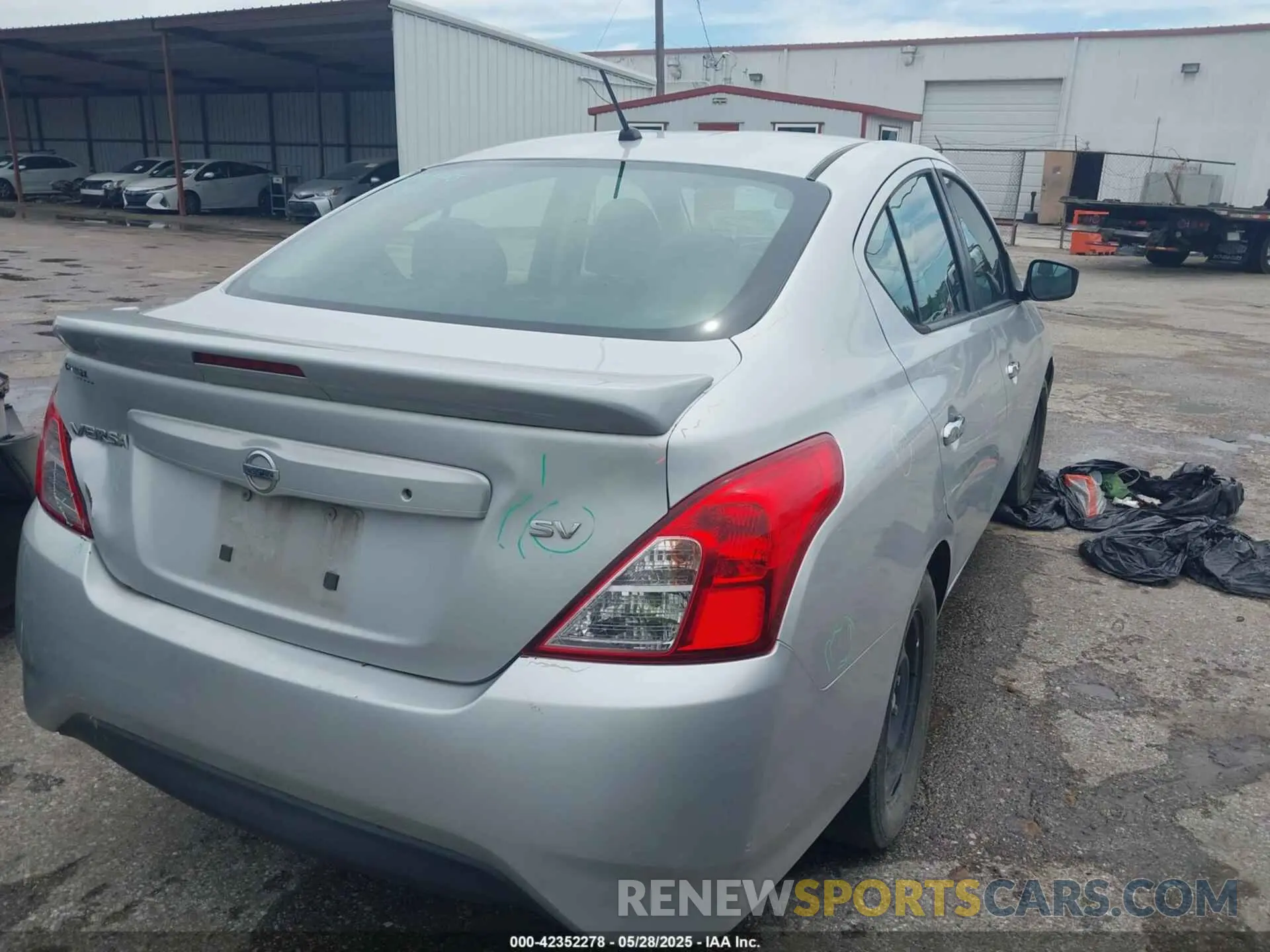 4 Photograph of a damaged car 3N1CN7AP0KL852246 NISSAN VERSA 2019