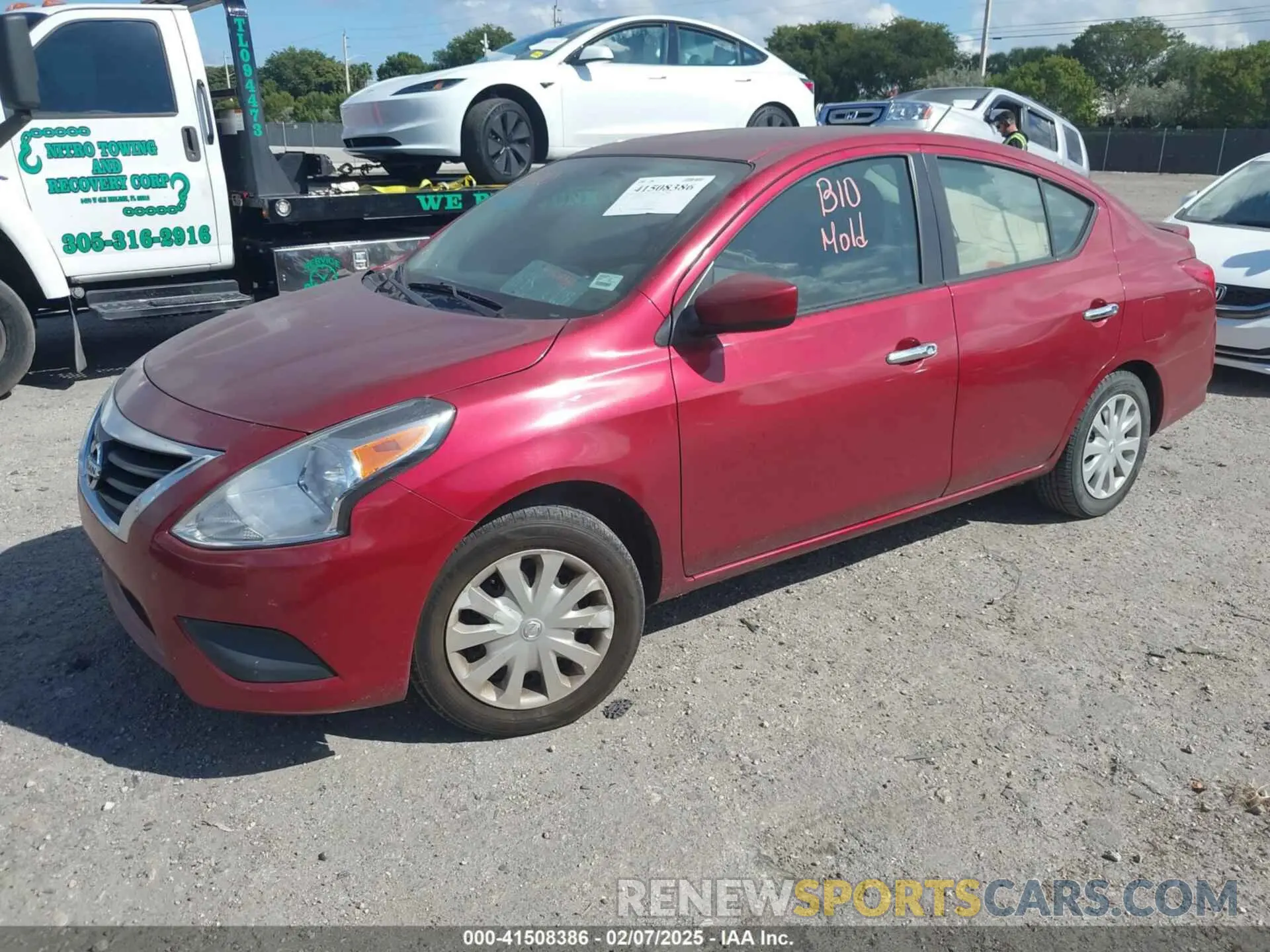 2 Photograph of a damaged car 3N1CN7AP0KL867880 NISSAN VERSA 2019