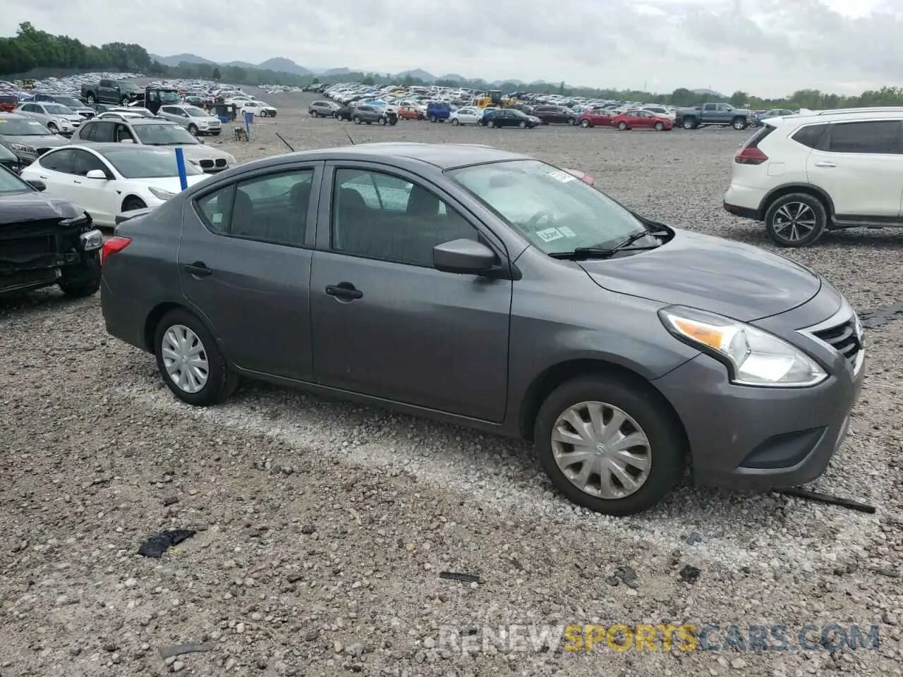 4 Photograph of a damaged car 3N1CN7AP1KL823886 NISSAN VERSA 2019