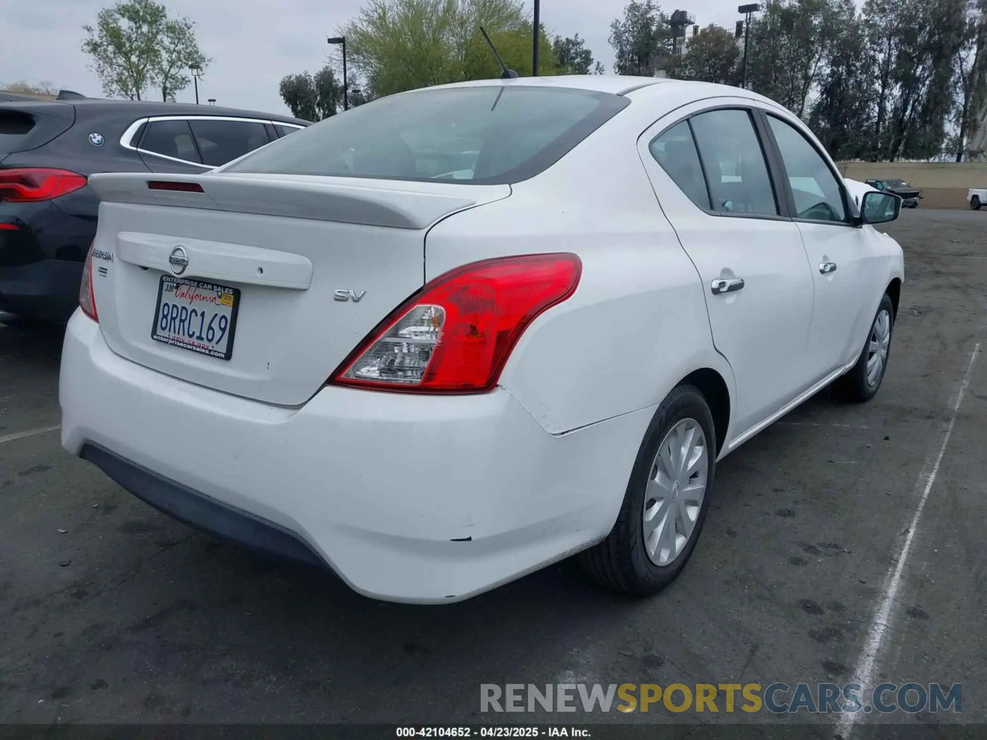 4 Photograph of a damaged car 3N1CN7AP1KL841496 NISSAN VERSA 2019