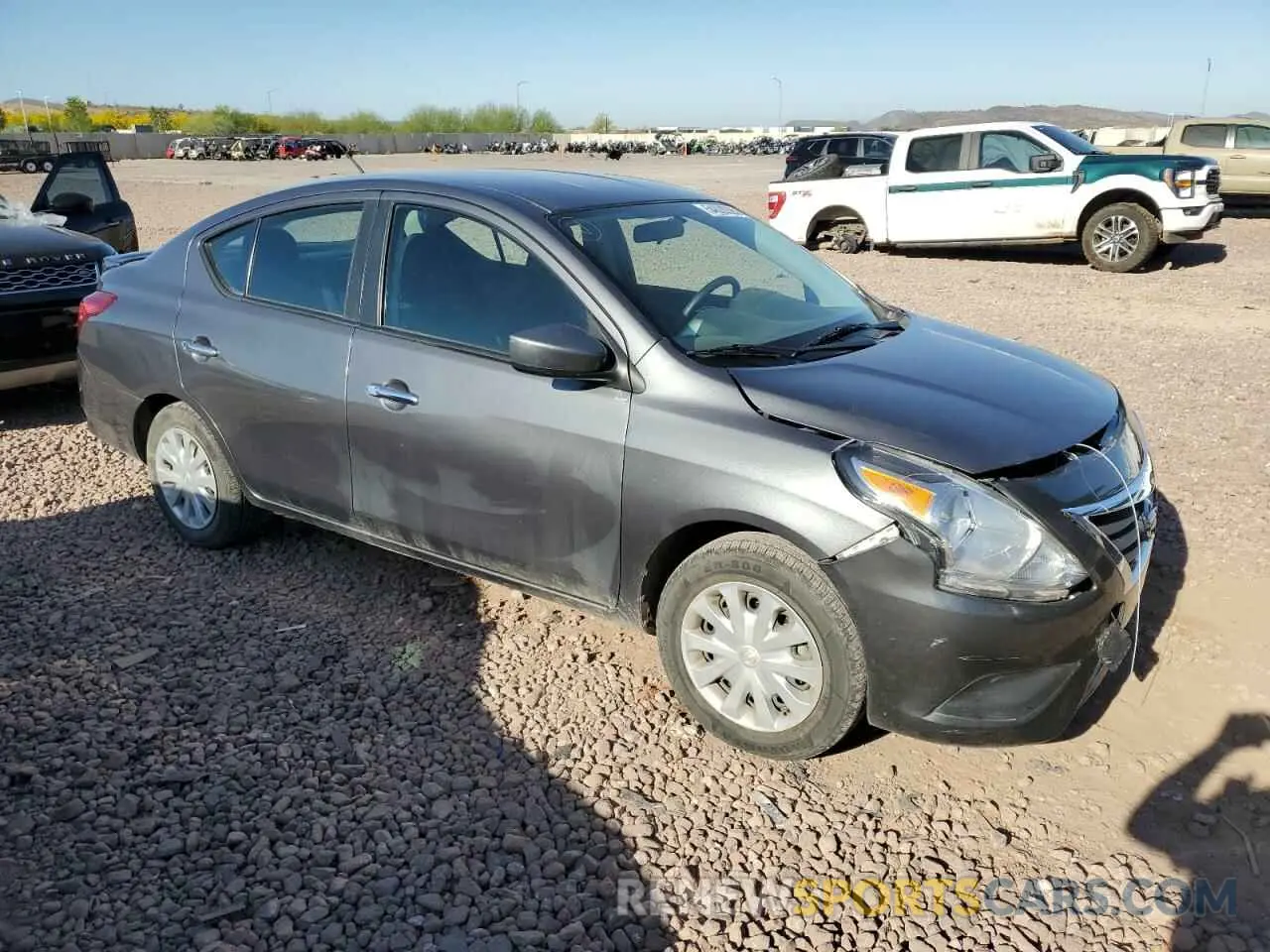 4 Photograph of a damaged car 3N1CN7AP1KL842003 NISSAN VERSA 2019