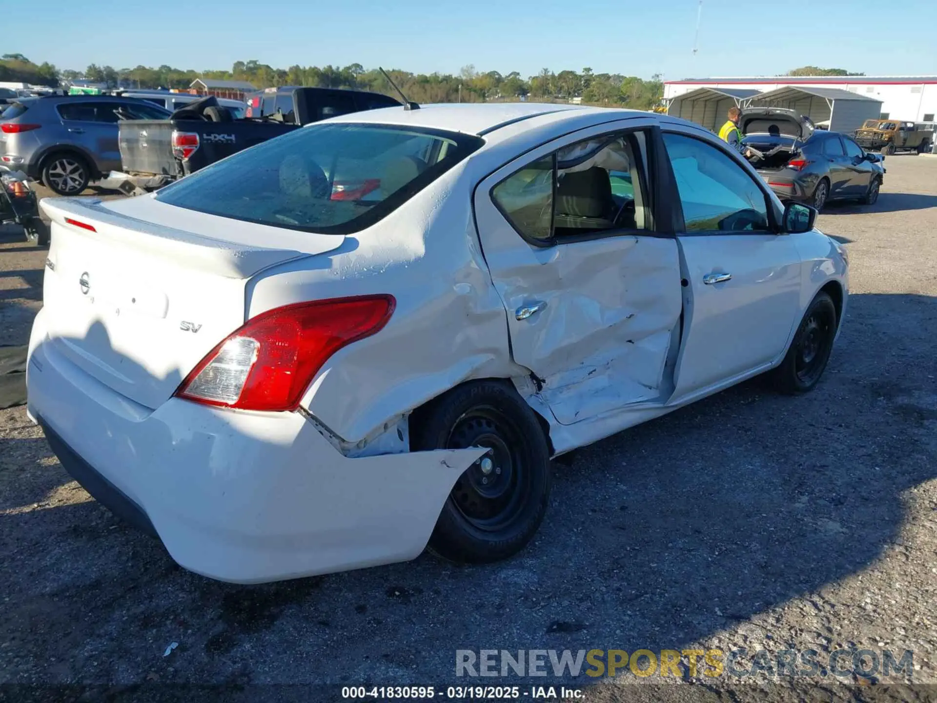 4 Photograph of a damaged car 3N1CN7AP1KL860534 NISSAN VERSA 2019