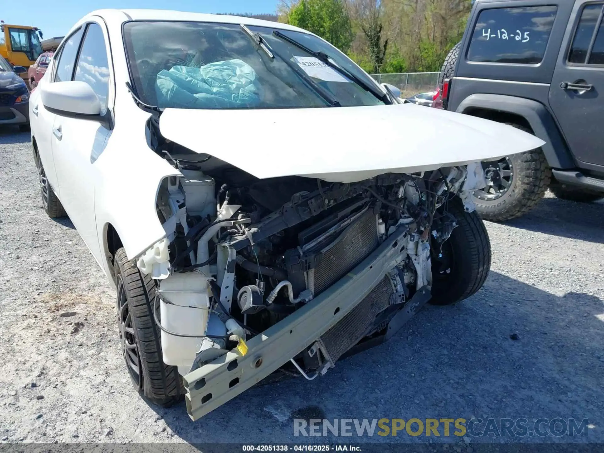 19 Photograph of a damaged car 3N1CN7AP1KL871615 NISSAN VERSA 2019