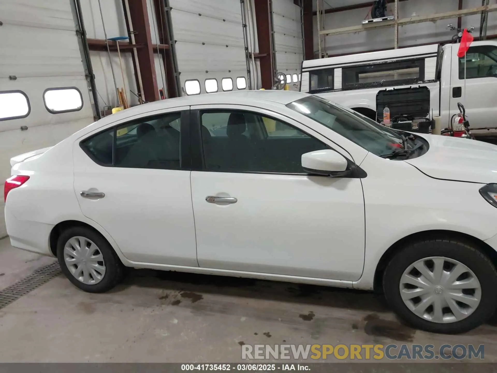 13 Photograph of a damaged car 3N1CN7AP2KL827865 NISSAN VERSA 2019