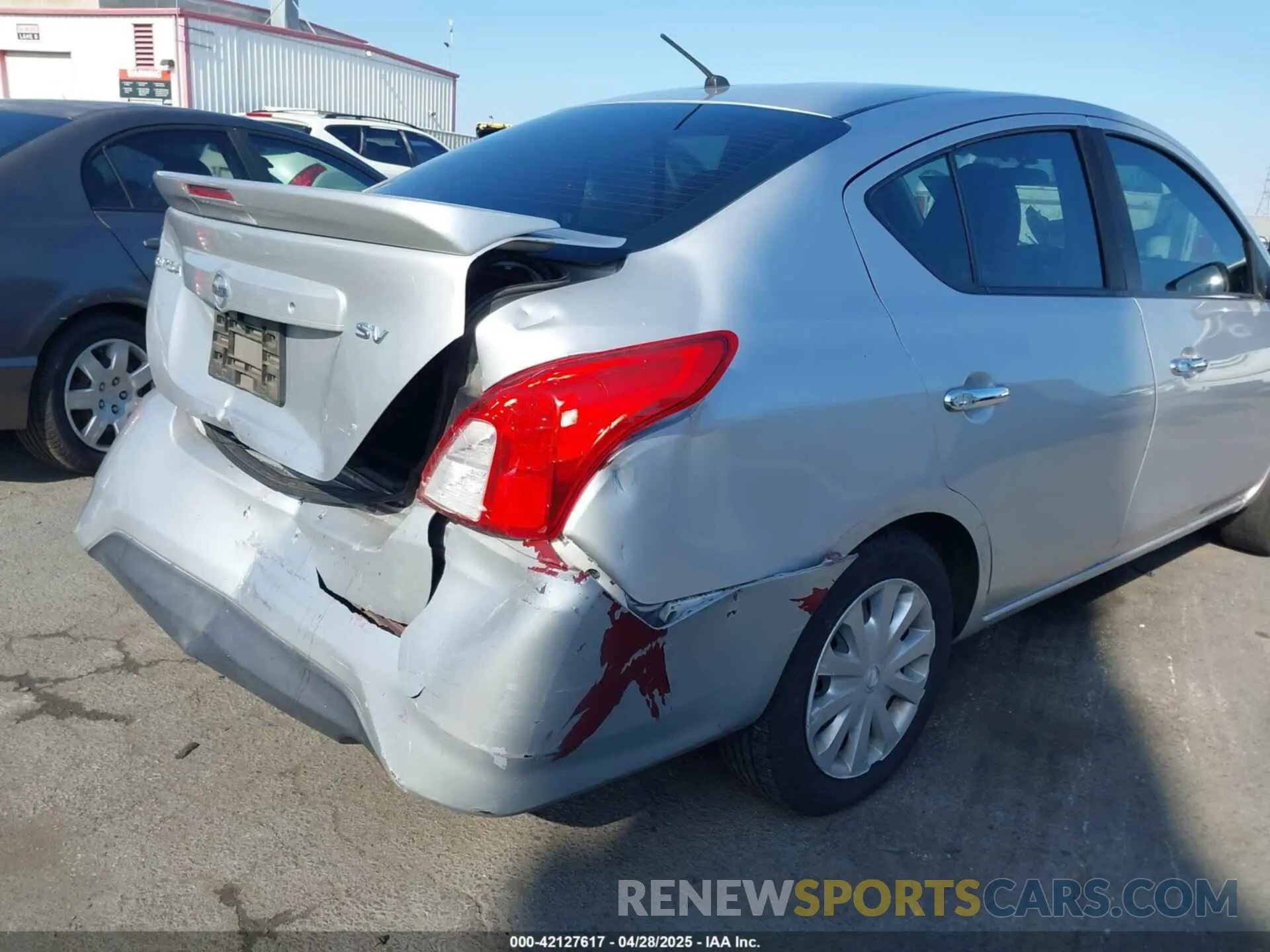 17 Photograph of a damaged car 3N1CN7AP2KL843581 NISSAN VERSA 2019