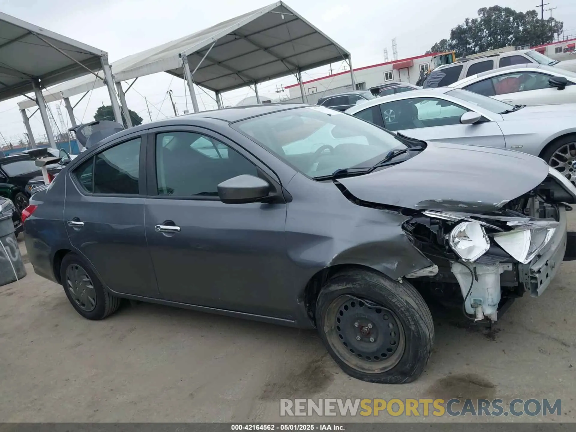 14 Photograph of a damaged car 3N1CN7AP2KL862485 NISSAN VERSA 2019