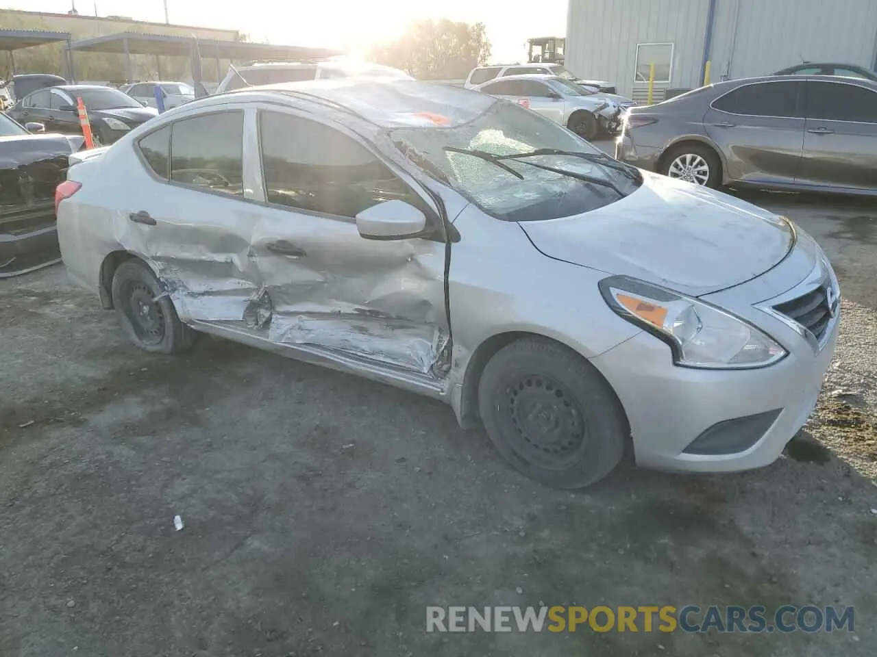 4 Photograph of a damaged car 3N1CN7AP3KL816812 NISSAN VERSA 2019