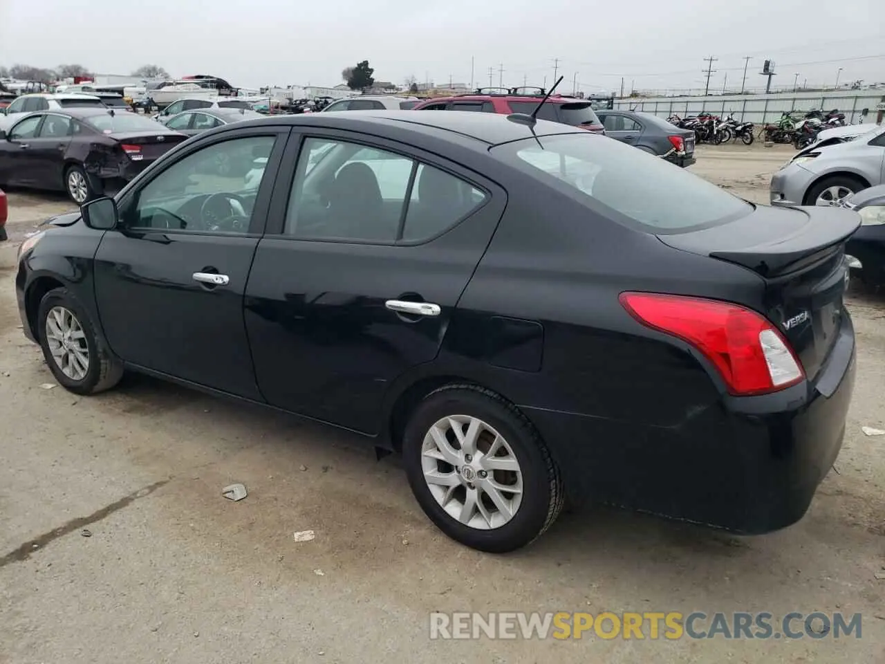 2 Photograph of a damaged car 3N1CN7AP3KL869476 NISSAN VERSA 2019