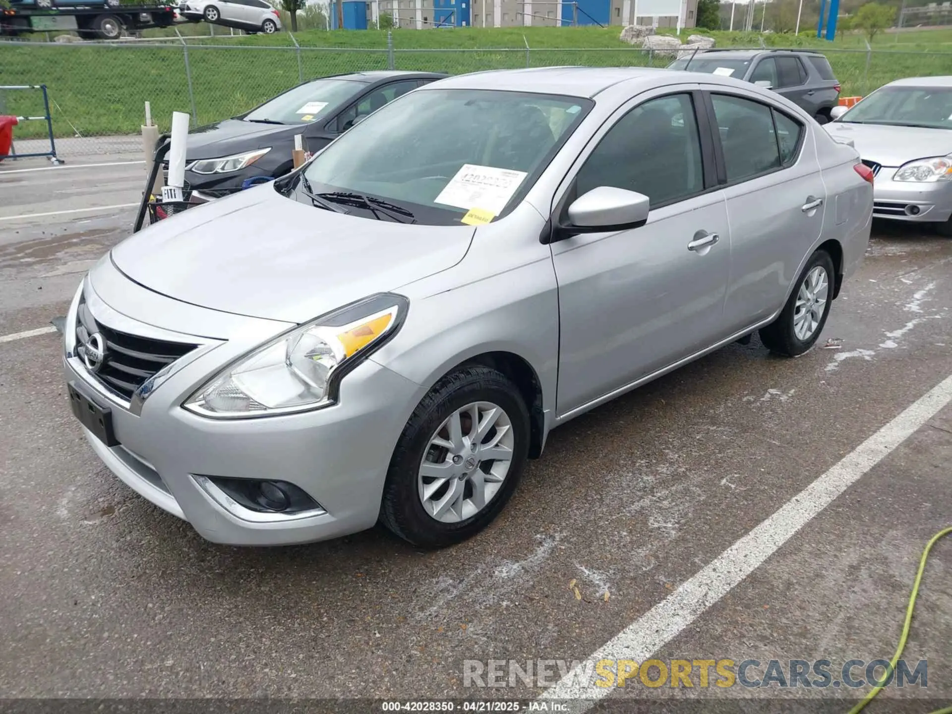 2 Photograph of a damaged car 3N1CN7AP4KL816964 NISSAN VERSA 2019