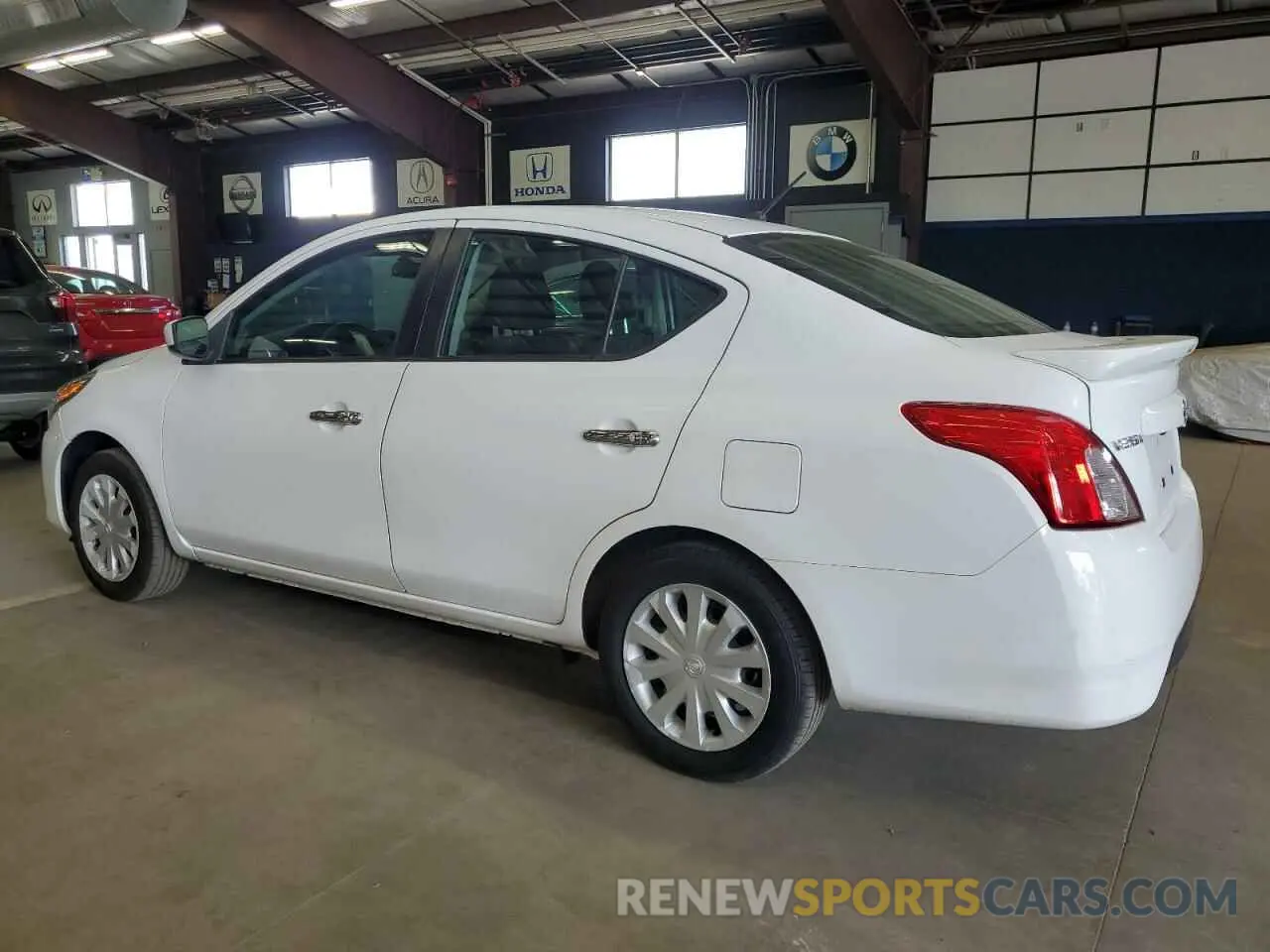 2 Photograph of a damaged car 3N1CN7AP4KL852069 NISSAN VERSA 2019