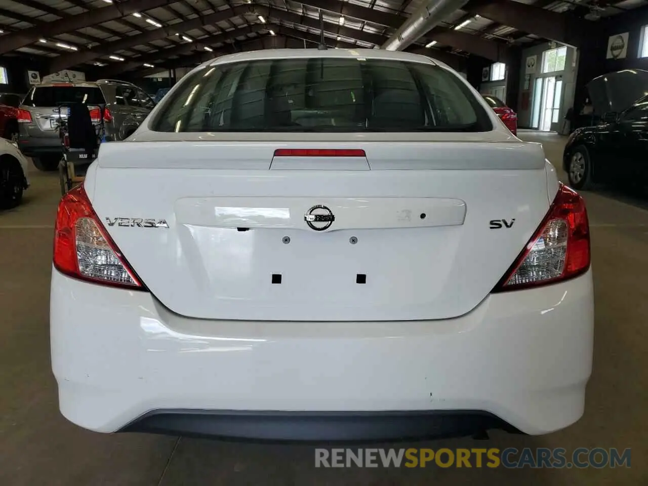 6 Photograph of a damaged car 3N1CN7AP4KL852069 NISSAN VERSA 2019