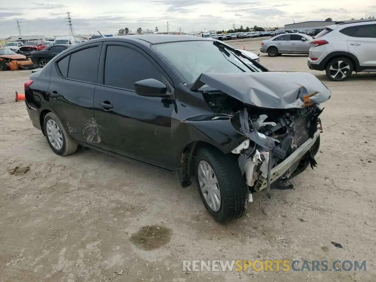 4 Photograph of a damaged car 3N1CN7AP5KL811109 NISSAN VERSA 2019
