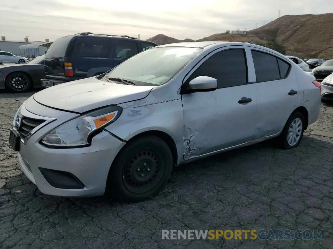 1 Photograph of a damaged car 3N1CN7AP6KL816223 NISSAN VERSA 2019