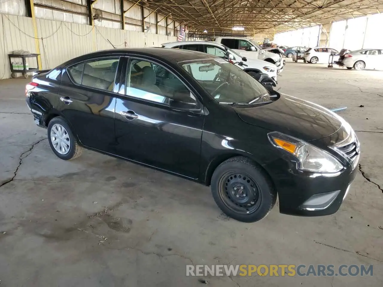4 Photograph of a damaged car 3N1CN7AP6KL844443 NISSAN VERSA 2019
