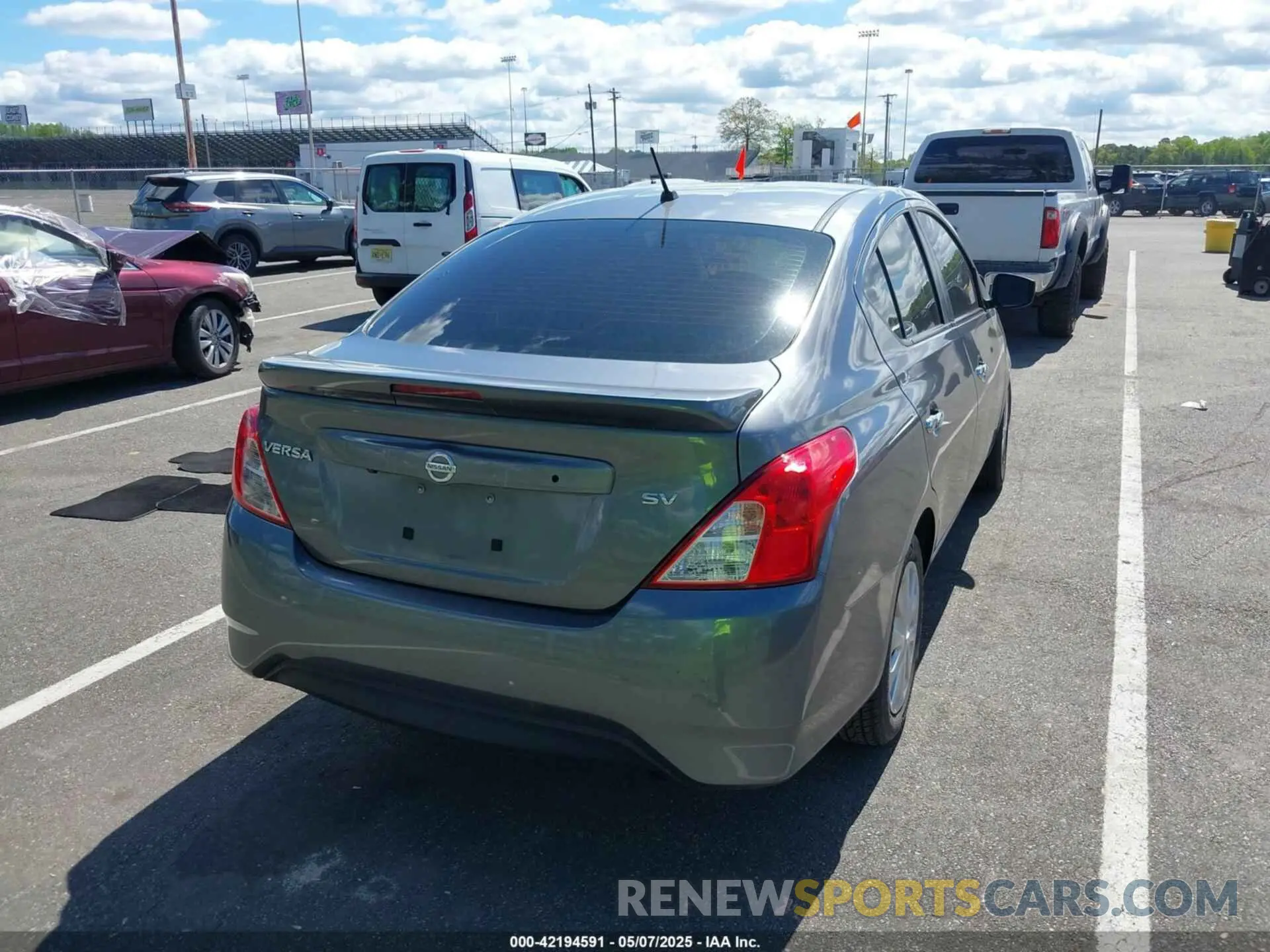 4 Photograph of a damaged car 3N1CN7AP6KL872565 NISSAN VERSA 2019