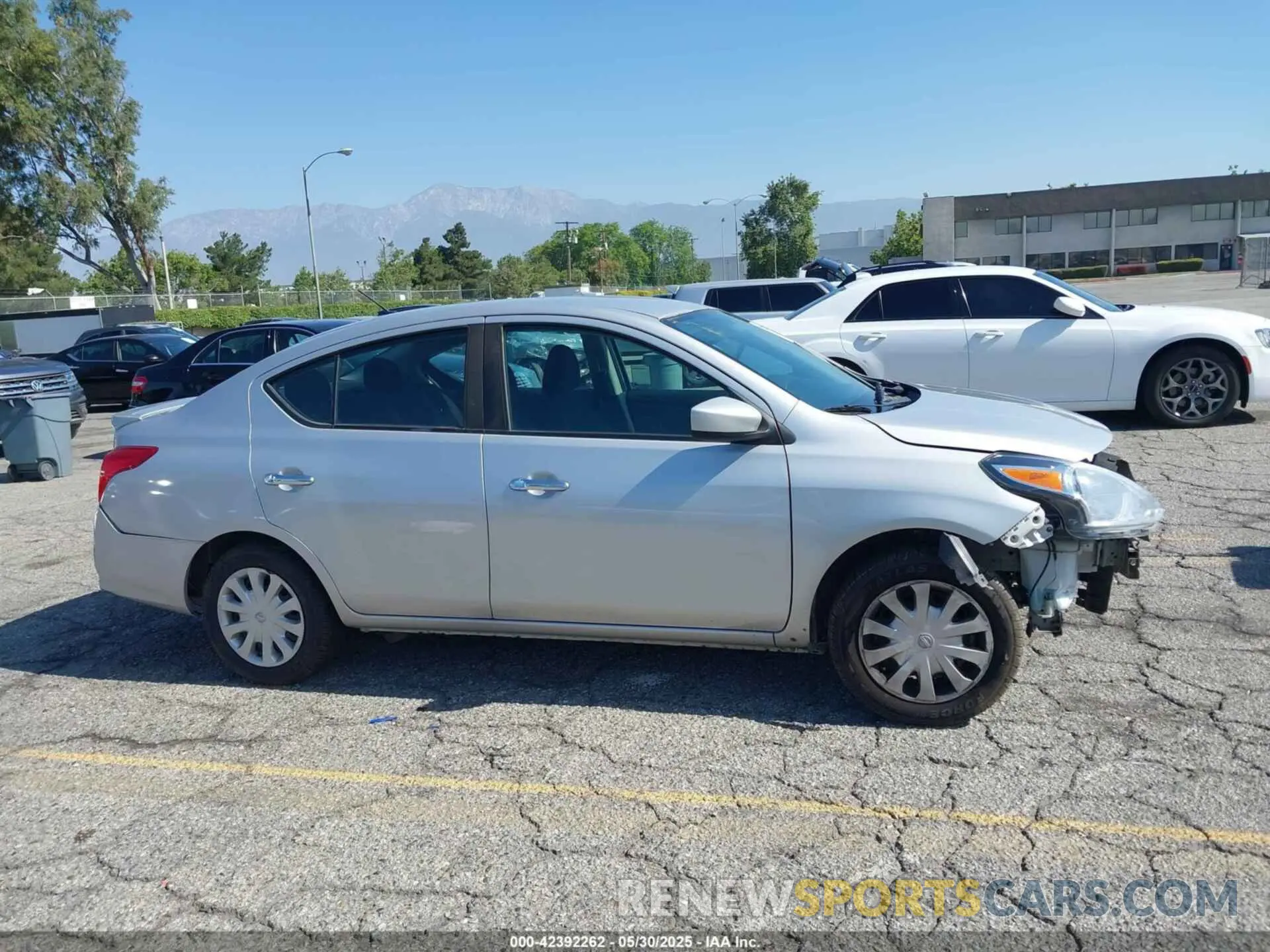 14 Photograph of a damaged car 3N1CN7AP6KL874283 NISSAN VERSA 2019
