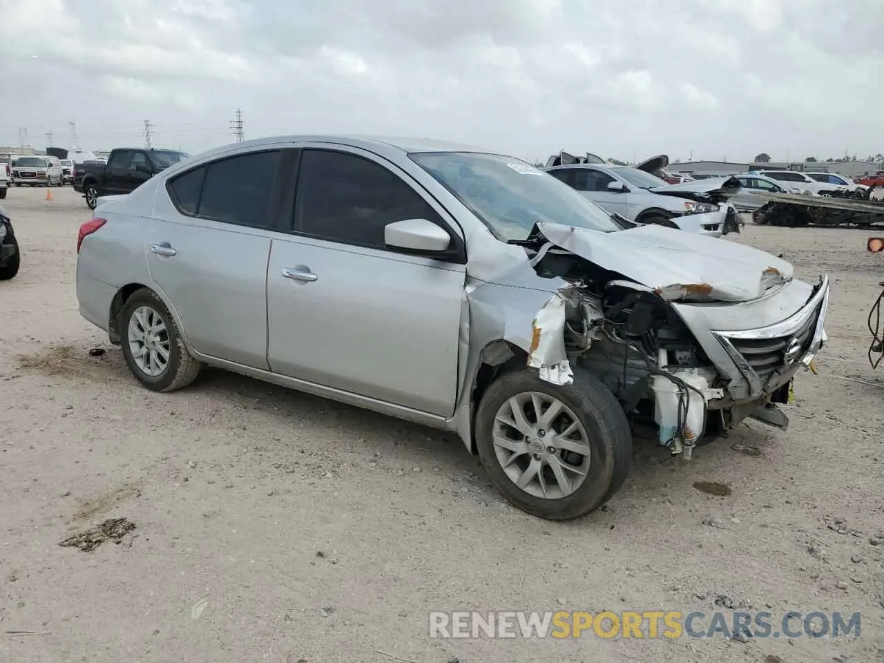 4 Photograph of a damaged car 3N1CN7AP7KL819275 NISSAN VERSA 2019