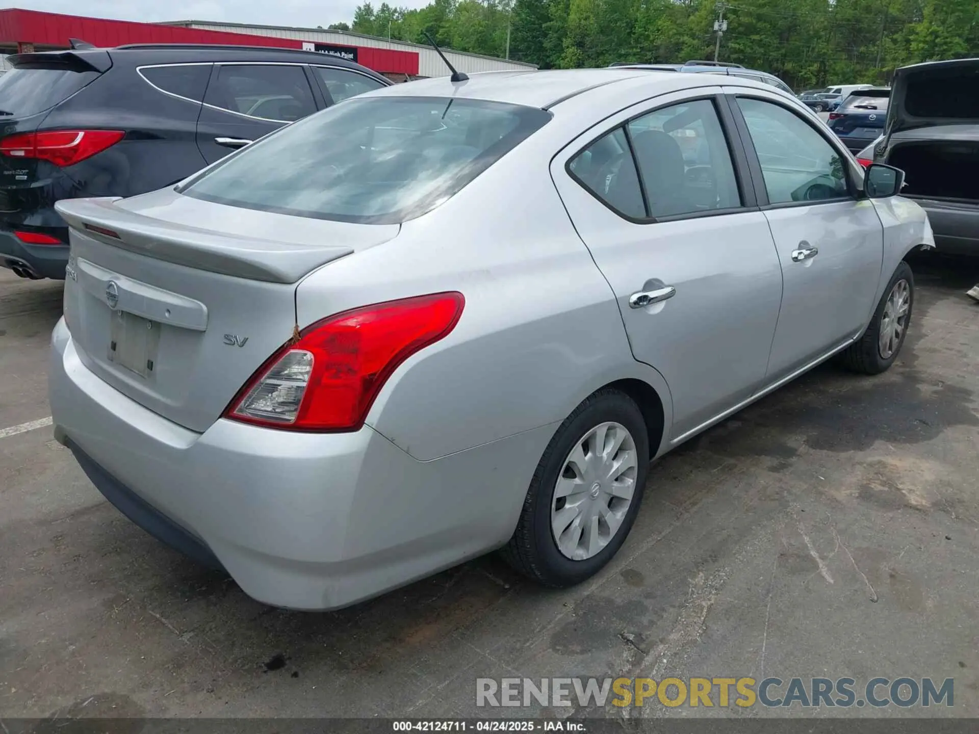 4 Photograph of a damaged car 3N1CN7AP7KL832771 NISSAN VERSA 2019