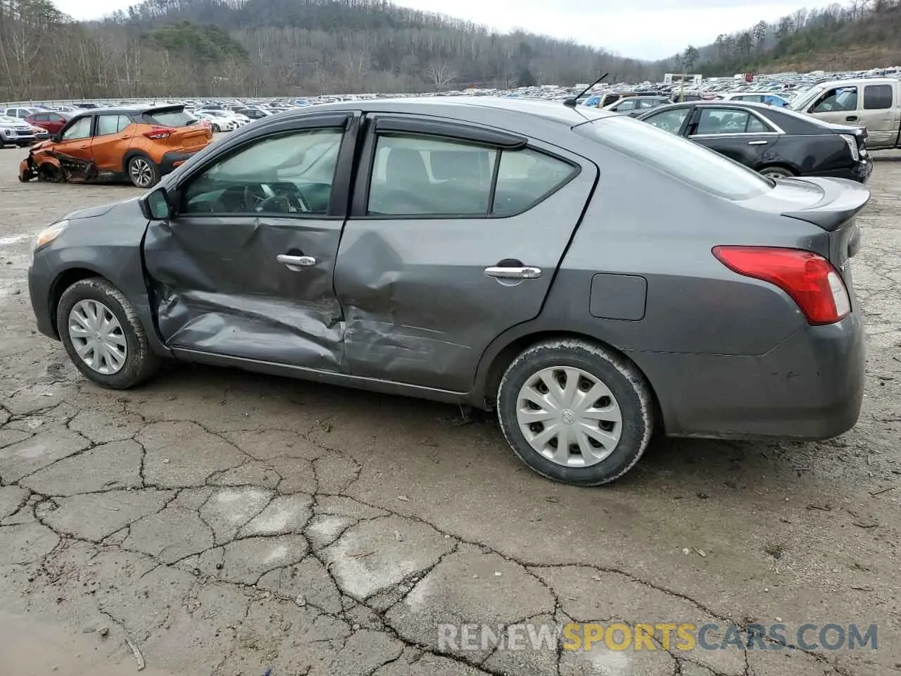 2 Photograph of a damaged car 3N1CN7AP7KL859954 NISSAN VERSA 2019