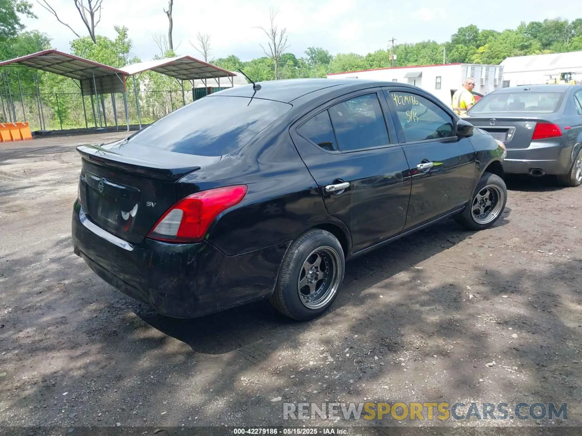 4 Photograph of a damaged car 3N1CN7AP7KL879749 NISSAN VERSA 2019