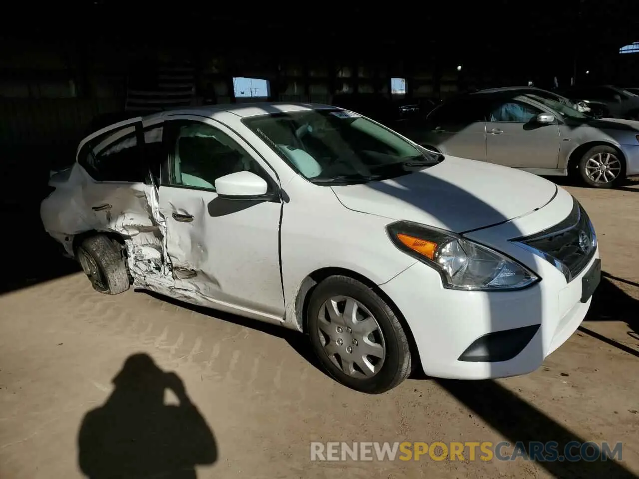 4 Photograph of a damaged car 3N1CN7AP8KL871353 NISSAN VERSA 2019