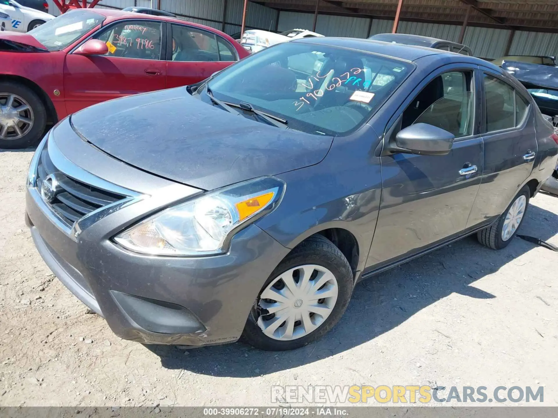 2 Photograph of a damaged car 3N1CN7AP9KL818600 NISSAN VERSA 2019