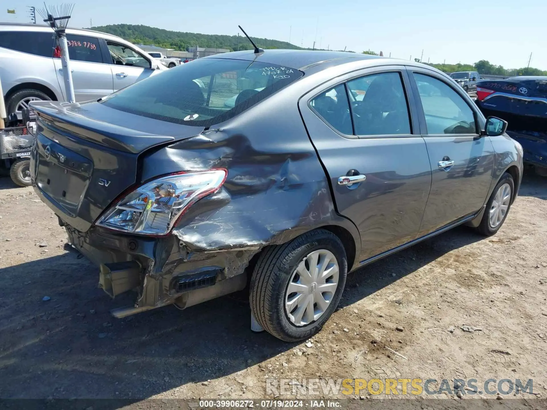 4 Photograph of a damaged car 3N1CN7AP9KL818600 NISSAN VERSA 2019