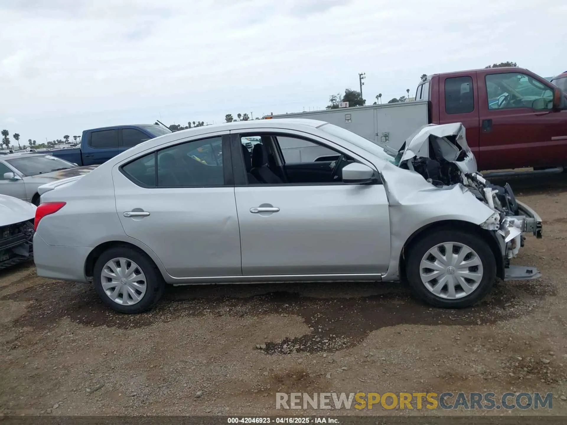 14 Photograph of a damaged car 3N1CN7APXKL803474 NISSAN VERSA 2019