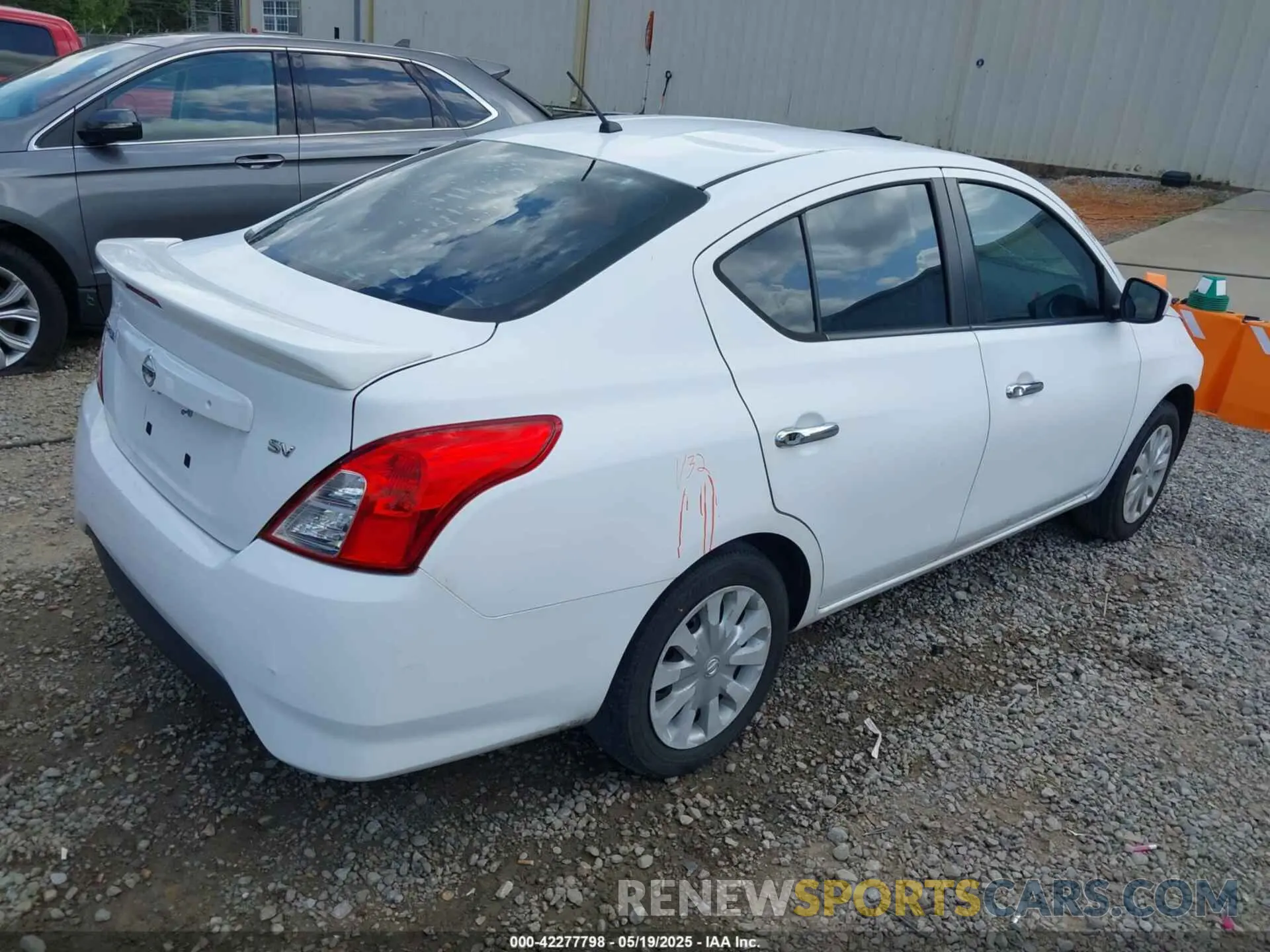 4 Photograph of a damaged car 3N1CN7APXKL831677 NISSAN VERSA 2019