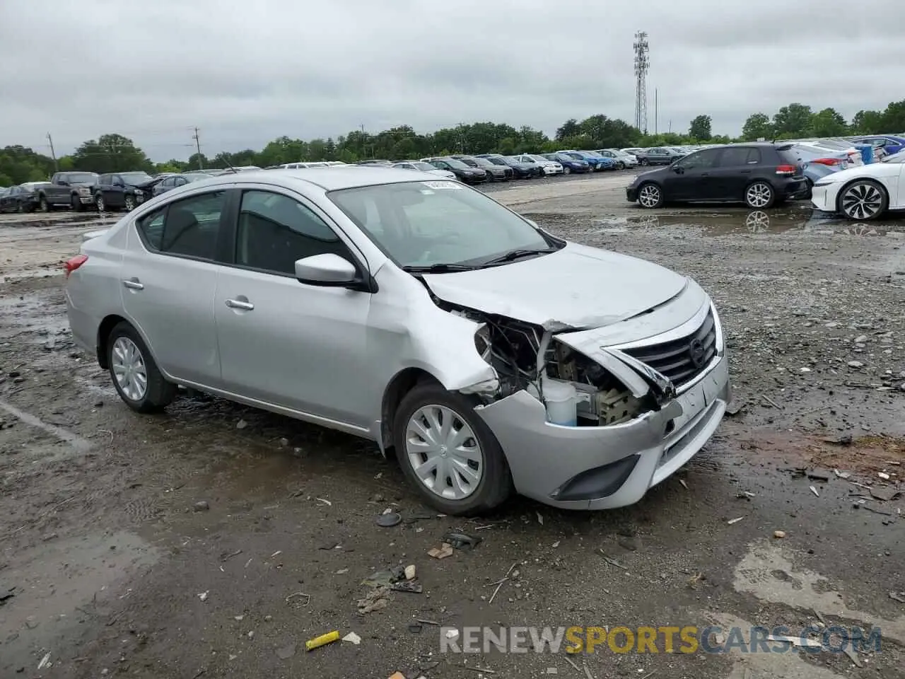 4 Photograph of a damaged car 3N1CN7APXKL832974 NISSAN VERSA 2019