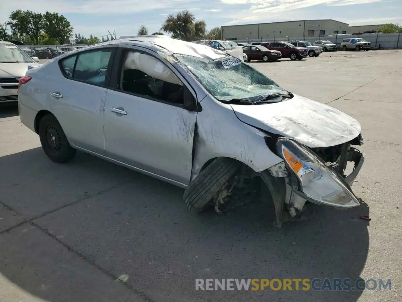 4 Photograph of a damaged car 3N1CN7APXKL873671 NISSAN VERSA 2019