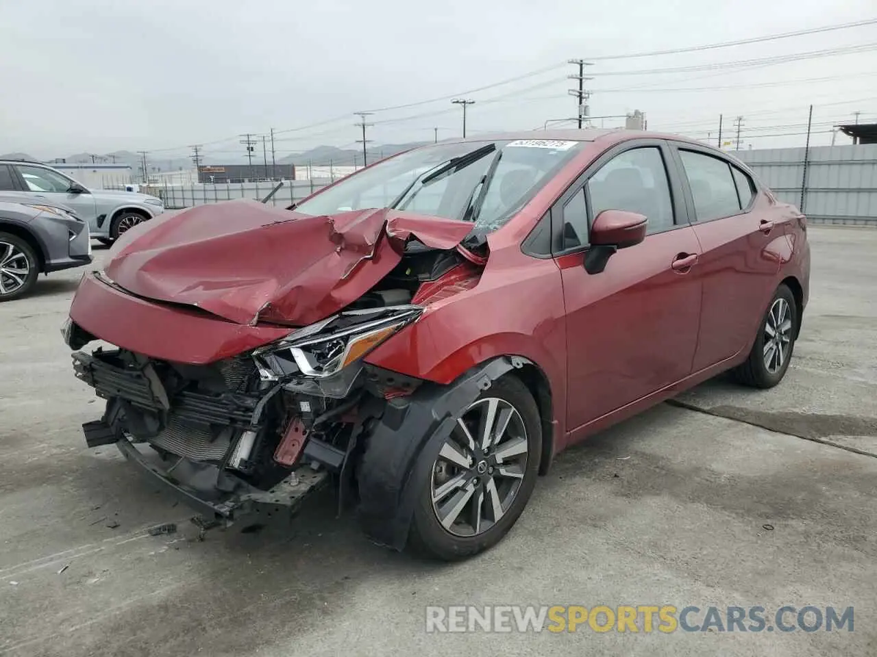 1 Photograph of a damaged car 3N1CN8EV0LL869340 NISSAN VERSA 2020