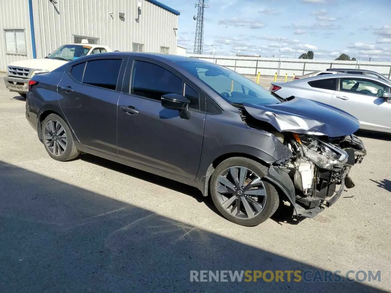 4 Photograph of a damaged car 3N1CN8FV7LL805634 NISSAN VERSA 2020