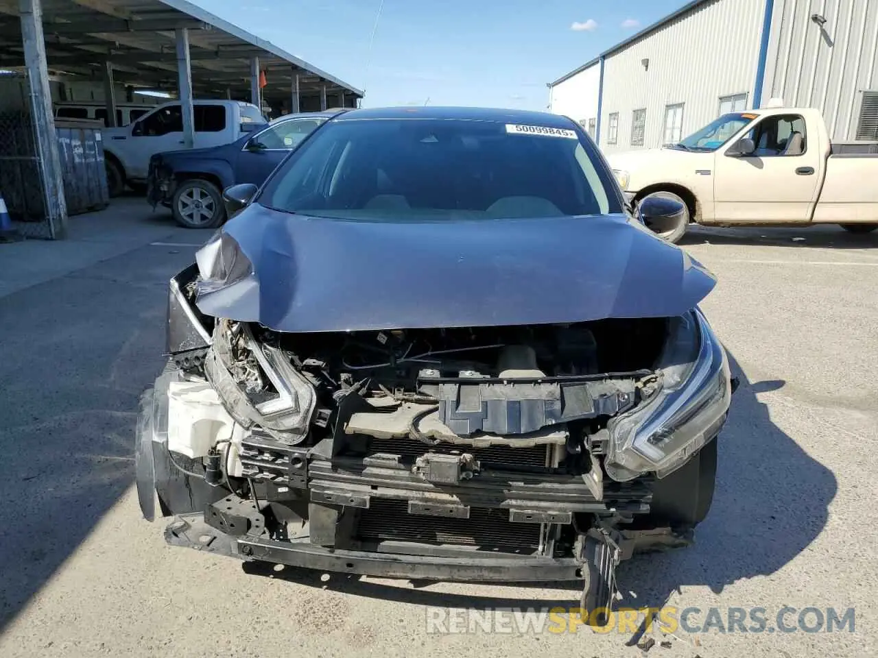5 Photograph of a damaged car 3N1CN8FV7LL805634 NISSAN VERSA 2020