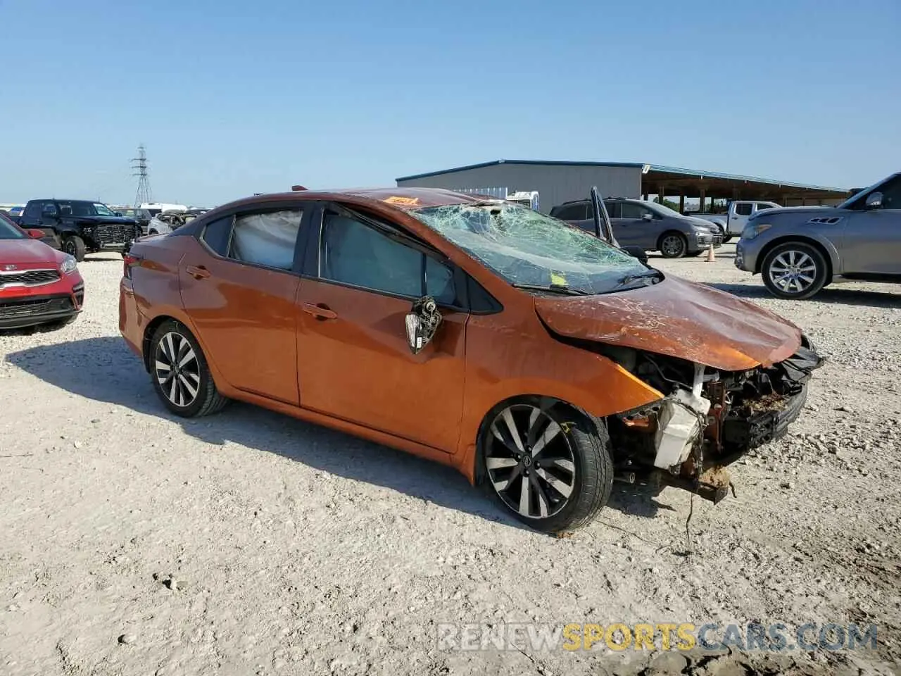 4 Photograph of a damaged car 3N1CN8FVXLL913133 NISSAN VERSA 2020